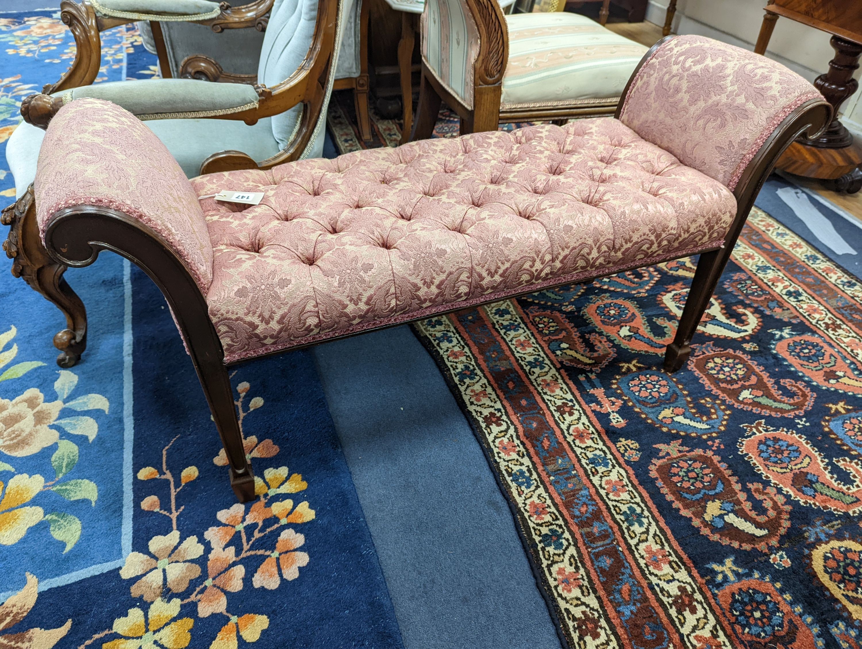 An Edwardian mahogany window seat, with deep buttoned upholstered seat, length 114cm, depth 38cm, height 57cm